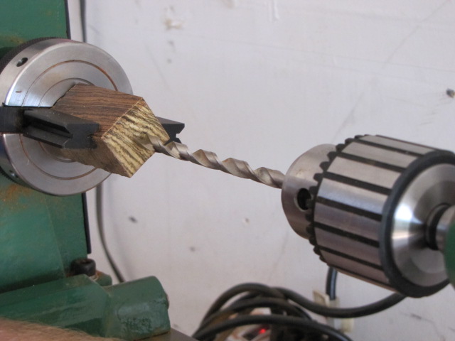 pull your tailstock up to the pen blank