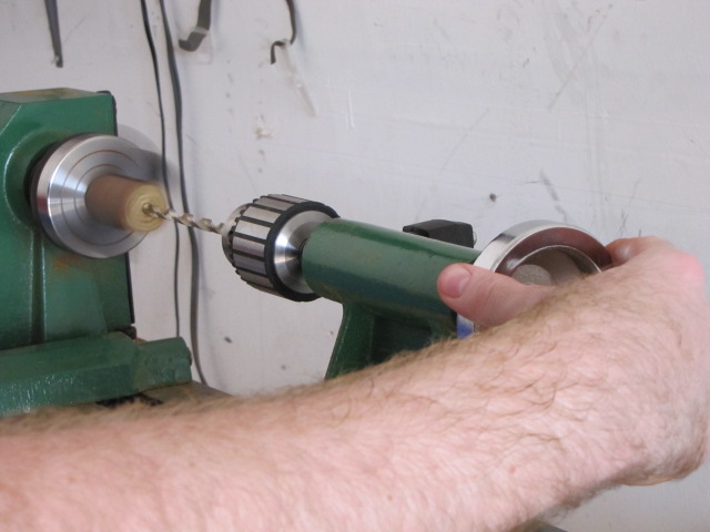 continue turning the handwheel until the tailstock is fully extended